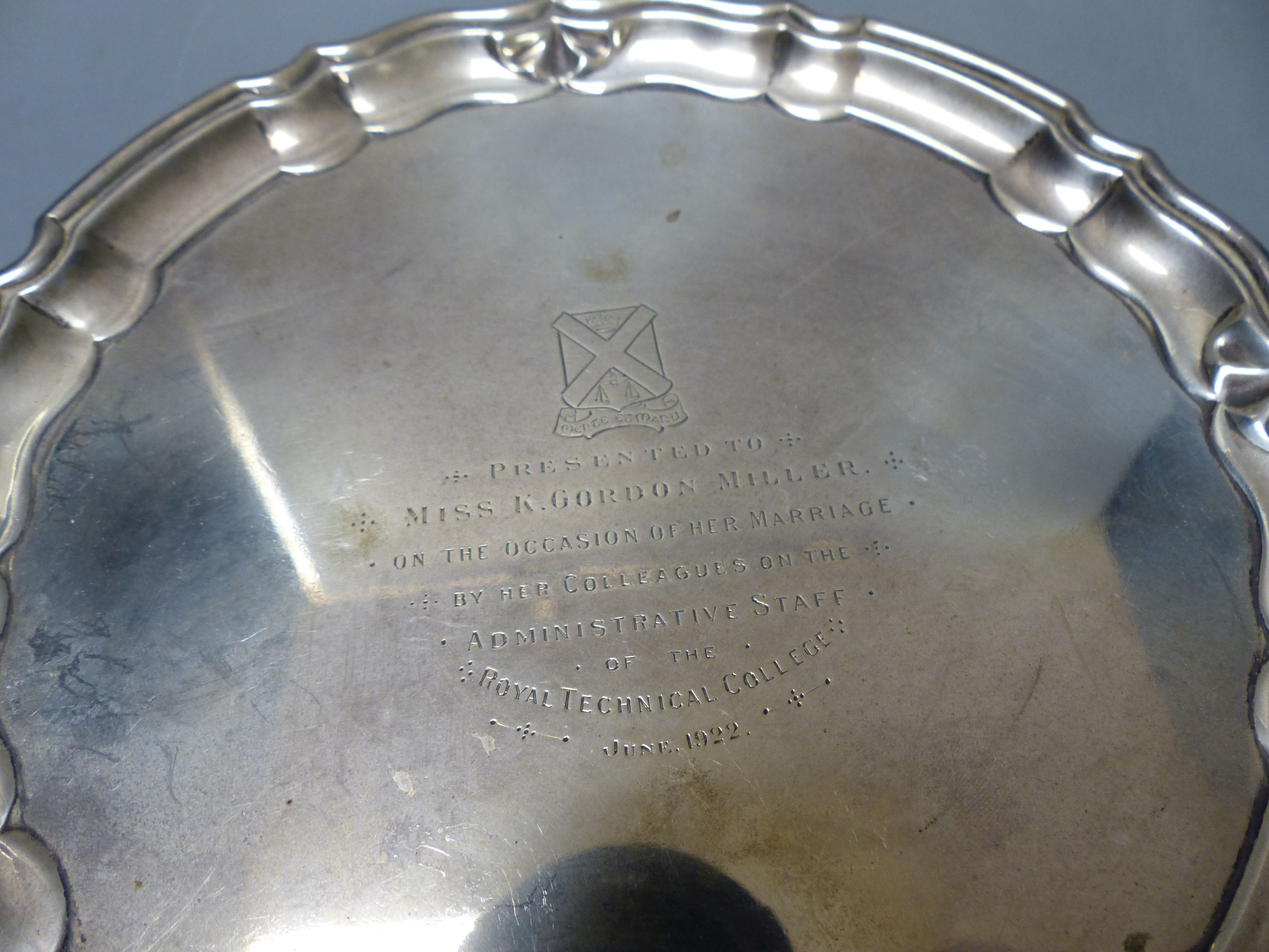 A George V silver waiter, Chester, 1921, 17.9cm and an Italian 800 standard white metal bowl embossed with fruit